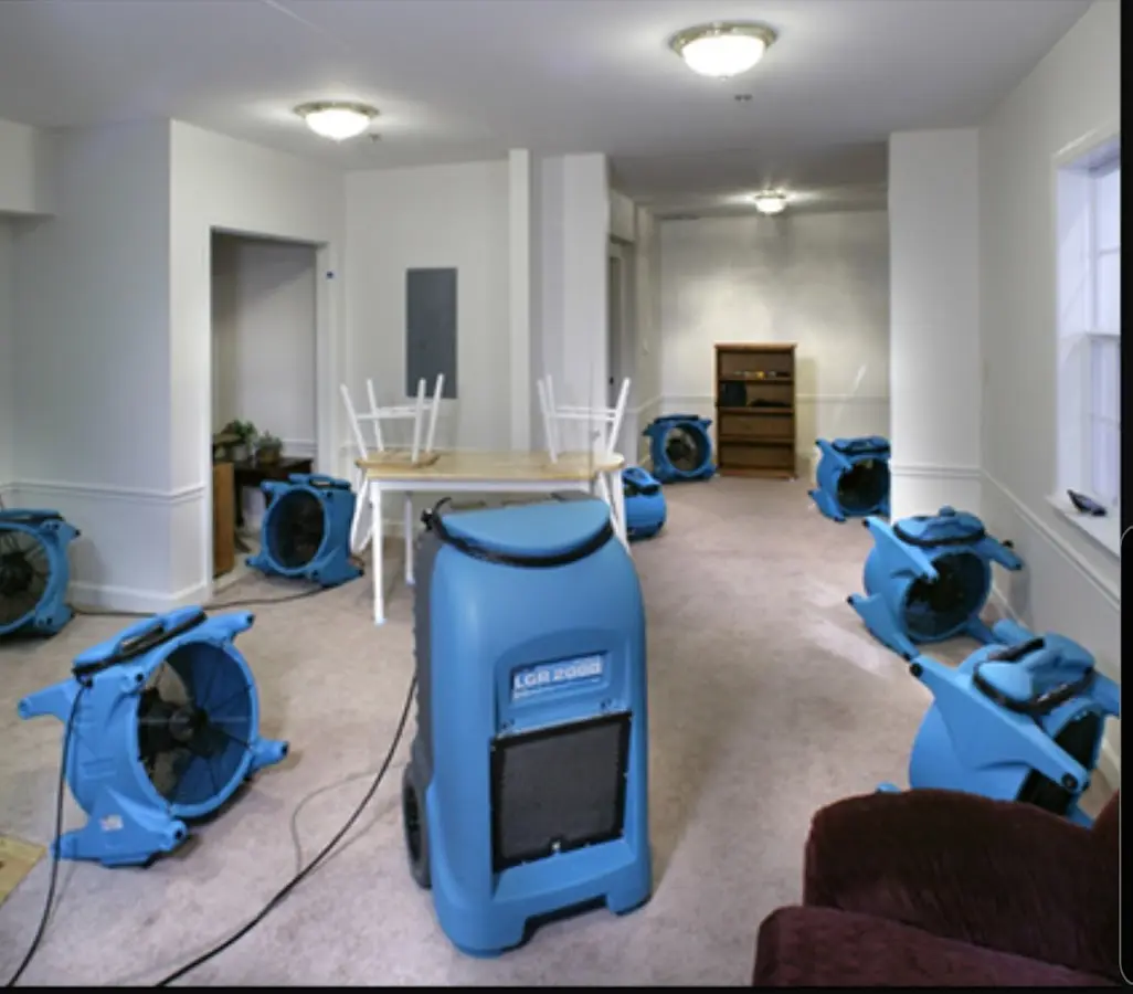 Air movers and dehumidifier setup for Water Damage Restoration in Anderson Creek